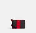 COACH Corner Zip Wristlet In Signature Canvas With Stripe image 1