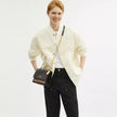 COACH Klare Crossbody Bag In Blocked Signature Canvas - Gold/Walnut/Tan image 1