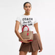 COACH Sadie Satchel Bag In Signature Canvas image 1