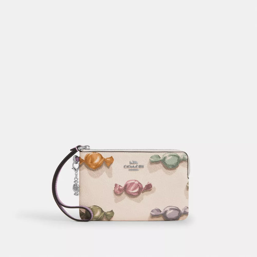 COACH Corner Zip Wristlet With Candy Print And Charm - Pebbled leather/Silver image 0