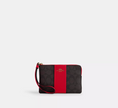 COACH Corner Zip Wristlet In Signature Canvas With Stripe - Gold/Walnut/Bold Red image