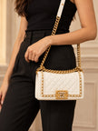 CHANEL Quilted Small Around Boy White Caviar Aged Gold Hardware