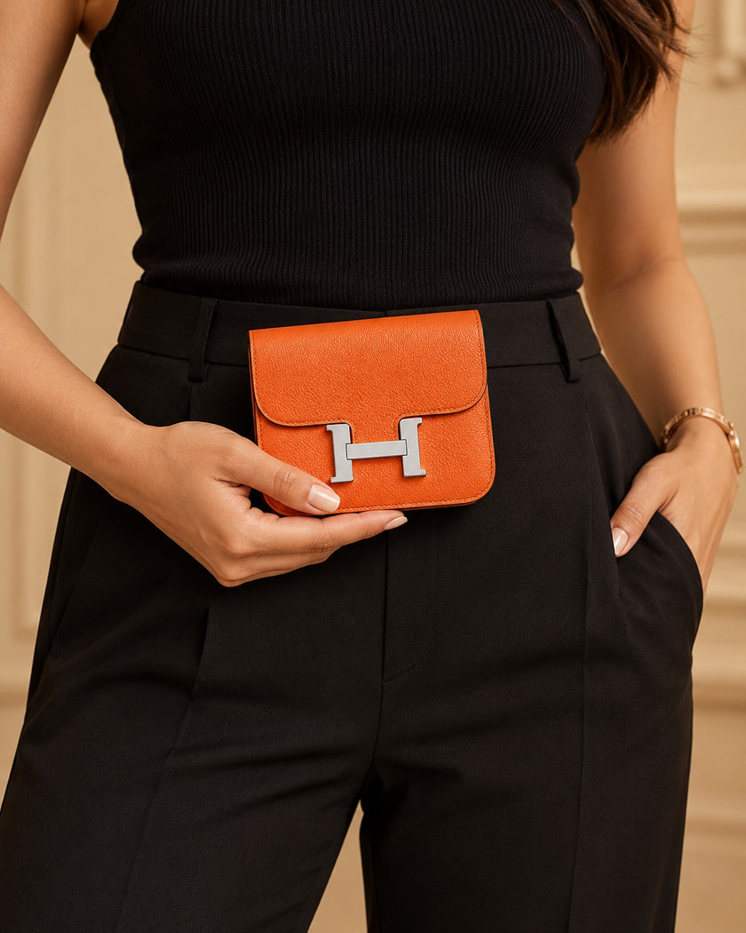 HERMÈS Constance Slim wallet Orange