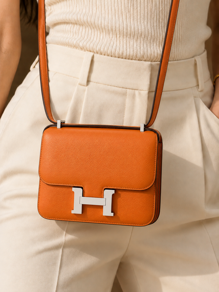 HERMÈS Constance 3 Mini 18 Apricot Evercolor Women's Bag