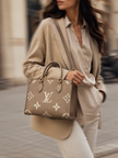 LOUIS VUITTON Onthego Tourterelle Claim Size PM