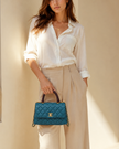 CHANEL Small Coco Handle Quilted Green Caviar Aged Gold Hardware Lizard Handle