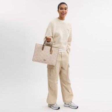 COACH Maggie Tote Bag In Blocked Signature Canvas - Gold/Sand/Tan image 1