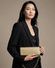 MICHAEL KORS Jet Set Medium Metallic Leather Clutch - Pale Gold image 0
