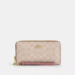 COACH Long Zip Around Wallet In Signature Canvas (Arriving In Delhi) image 0