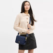 COACH Carey Crossbody Bag In Signature Canvas - Gold/Navy
