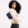 COACH Nolita 19 In Signature Canvas - Gold/Navy