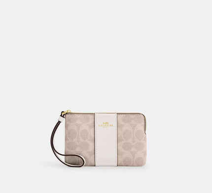 [At India] COACH Corner Zip Wristlet In Signature Canvas With Stripe - Sand/Chalk