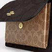 COACH Klare Crossbody Bag In Blocked Signature Canvas - Gold/Walnut/Tan image 4