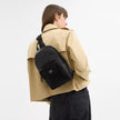COACH Turnlock Sling Pack In Signature Canvas image 1
