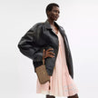 COACH Nolita 19 In Signature Canvas - Gold/Tan/Brown image 1