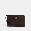 COACH Large Corner Zip Wristlet In  Signature Canvas - Gold/Brown Black image