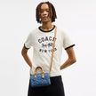 COACH Mini Rowan Crossbody Bag In Signature Denim - Gold/Indigo image 1